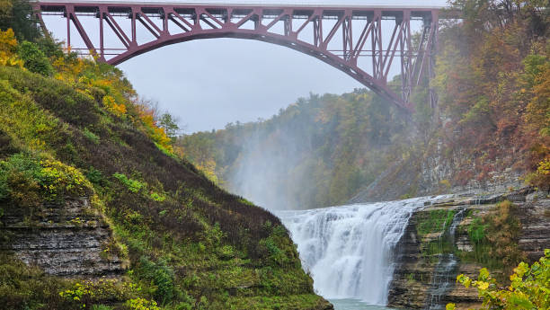 istock River flow and fall with vibrant color in a cloudy day during autumn season 2073979091