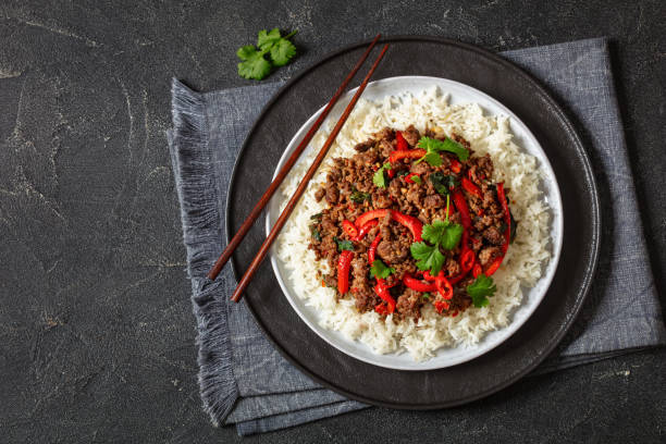 istock Thai holy basil stir fry with ground beef on plate 2073980704
