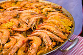 Paella. Traditional Spanish food, pan-seared seafood paella with mussels, prawns and squid.