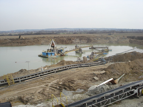 Odessa, Ukraine - June 12, 2023: Consequences of the Accident at the Kakhovka power plant, pollution of the beaches of Odessa with garbage and plant remains brought by water