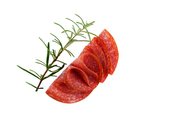 Salami smoked sausage slices on background
