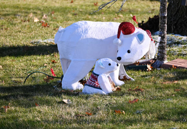 Outdoor polar bears in the front yard.