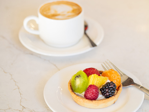 Fruit Tart and cup of coffee