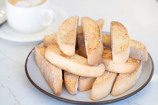 Biscotti's on a plate with Coffee