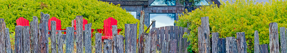 Cottage and rustic fence along the shore of Pacific Rim National Park on Vancouver Island, British Columbia