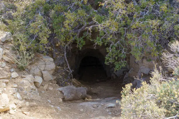 Mine shaft cave entrance at Eagle Cliff Mine cabin in Joshua Tree National Park, California