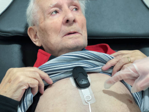 istock An elderly man in the hospital while having his Holter applied 2074251763