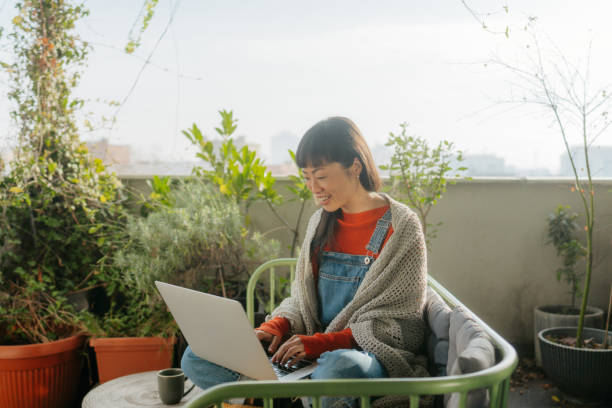 istock Japanese woman having a video call 2074280360