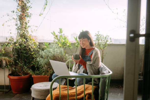 istock Japanese woman having a video call 2074283095