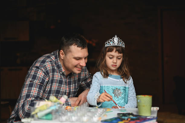 istock Cheerful father with cute daughter spending time together . 2074381985