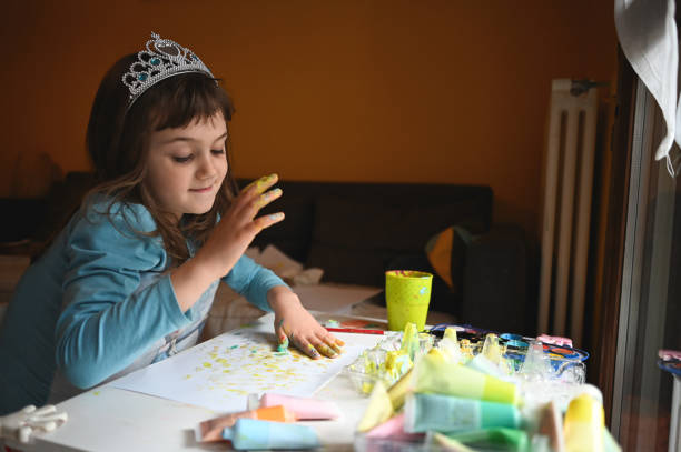 istock Little princess and finger painting. 2074384071