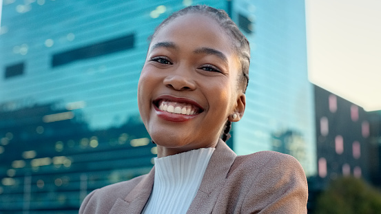 Portrait, city and happy business black woman in morning for commute, travel and journey in town. Corporate, professional and person with confidence, pride and smile for career, job and working