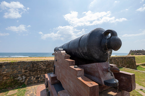 Old colonial artillery cannons on bastion along the coast line of Galle, Southern Province of Sri Lanka