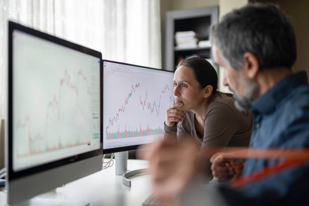 istock Stock Trading for Couples. Studying Stock Markets Together. 2074435666
