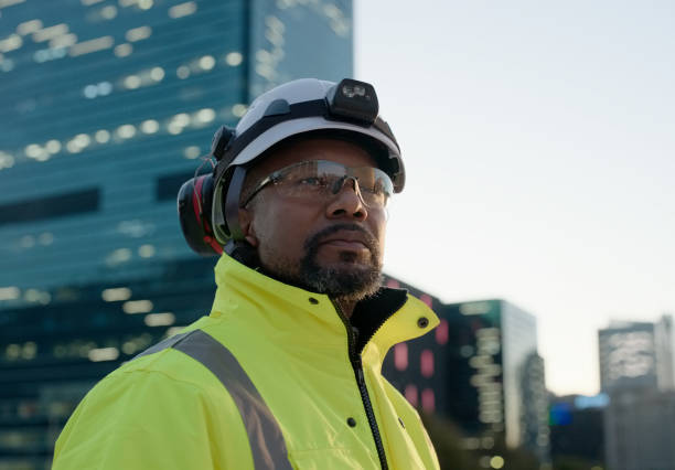 istock Man, construction worker and thinking at cityscape building for development or civil engineering, planning or architect. Male person, hardhat and downtown New York view for contractor, service or job 2074443389