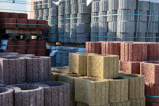 Concrete Cinder Formed Blocks for garden landscape design decoration, colored Uniformed brick Shapes.  Stack on Pallet