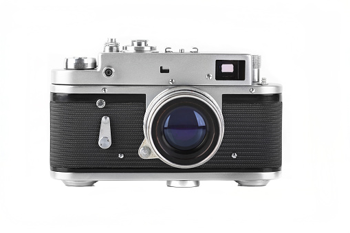 Vintage rangefinder camera 70s on white background.