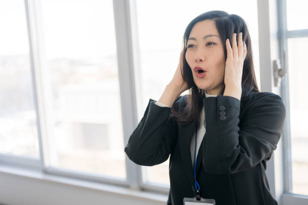 istock Business woman shock 2074562639