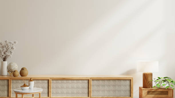 Wooden cabinet and accessories decor in living room interior on empty white wall background Wooden cabinet and accessories decor in living room interior on empty white wall background- 3D rendering modern cottage interior design stock pictures, royalty-free photos & images