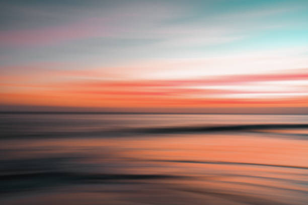 istock Red sunset over the sea, abstract, soft blur 2074747843