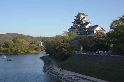 Landscape view of Okayama castle near the river in the Okayama city of Japan, 19 November 2023.