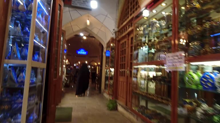 Point of view hyperlapse tourist walk in grand Bazaar Iran pass sellers