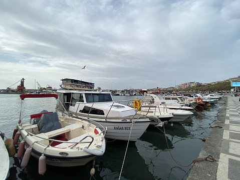 Silivri, Istanbul, Turkey - November 06, 2023: Fishing boats at Silivri Port of Istanbul city. Silivri is a touristic seaside resort on the European side of Istanbul