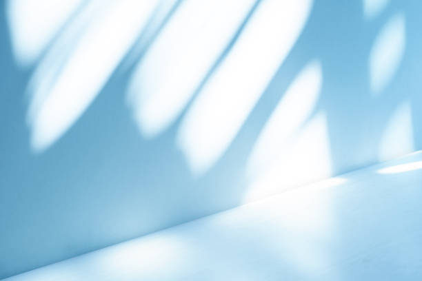 istock Wall interior background, studio, and backdrops show products. with shadow from window color white and blue light. background for text insertion and presentation of product 2074839413