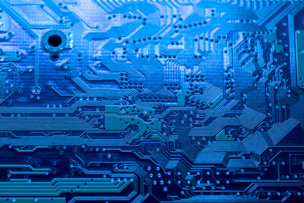 istock circuit computer motherboard. closeup mother board high-tech background. 2074840325