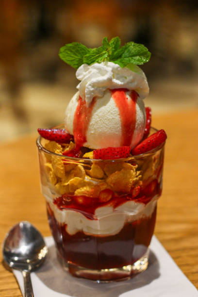istock Strawberry dessert with vanilla ice cream and corn crackers. 2074864686