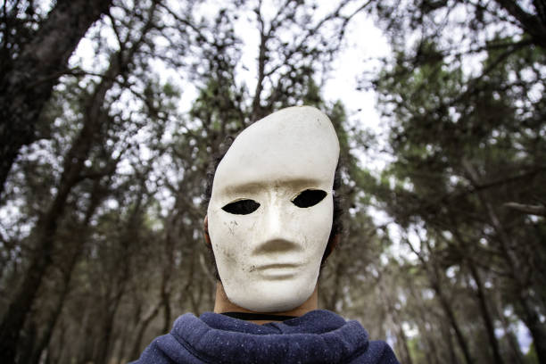 istock Halloween masks in the forest 2074868892