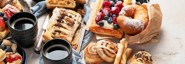 istock Freshly baked pastry. Delicious dessert table. 2074893639