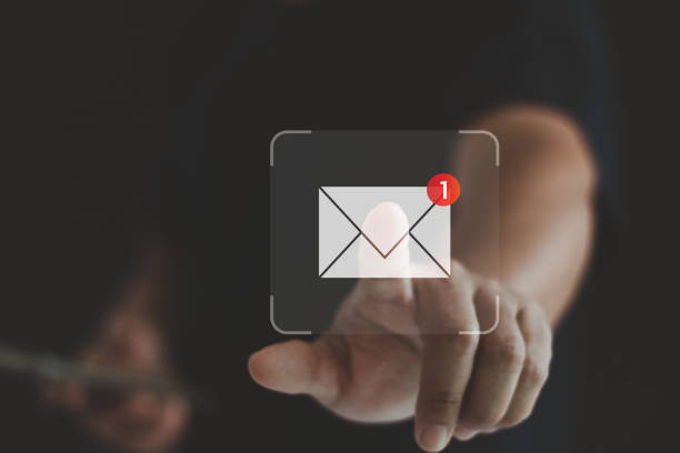 istock Business people touch on the email icon on the virtual screen. New electronic mail notification concept for business email communication and digital marketing technology. Inbox receiving message alert 2074905241