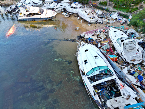 Drone view showcasing the extensive damage at the yacht club following Hurricane Otis, highlighting the chaos and destruction