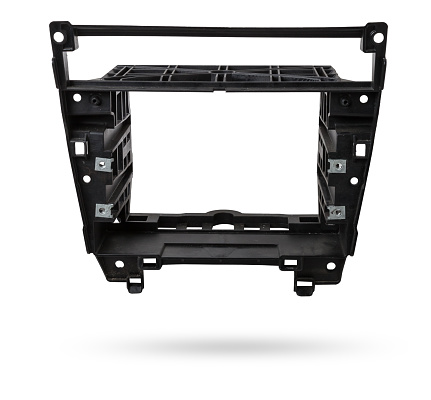 frame bracket of car 2din radio made of plastic on a white isolated background