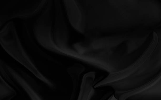 istock Black gray satin dark fabric texture luxurious shiny that is abstract silk cloth background with patterns soft waves blur beautiful. 2074949575