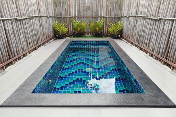 empty small private swimming pool - villa house marble tropical climate стоковые фото и изображения