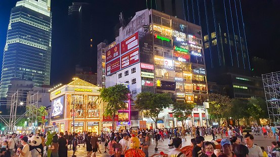 Ho Chi Minh City, Vietnam - ‎December 31, 2023 : Crowds Of People Visit Nguyen Hue Walking Street At Night.