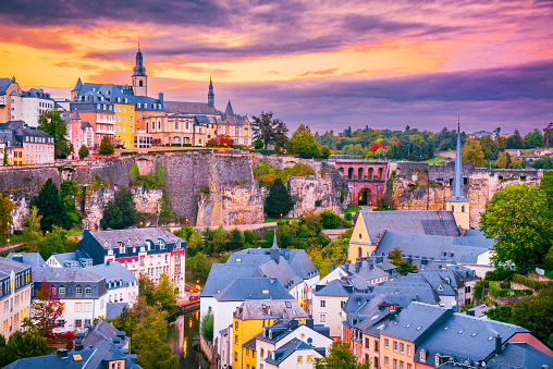Luxembourg City, twilight scenic with old town, Alzette River, beautiful colored sky clouds.