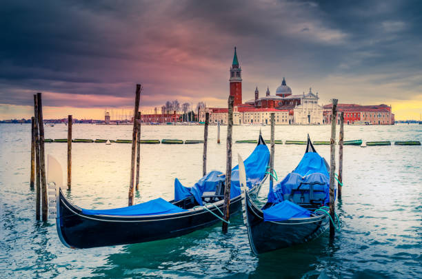 istock Venice Italy. Gondolas moored by Piazza San Marco, sunset colors. 2075070293