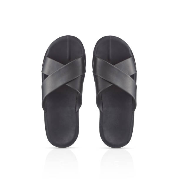 istock Top View Of Slippers Over White Background 2075074924