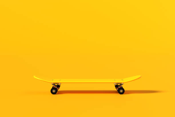istock Yellow skateboard on yellow background with copy space. 2075107009