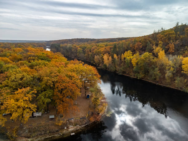 istock Autumn aerial river in vibrant forest scenery 2075116856