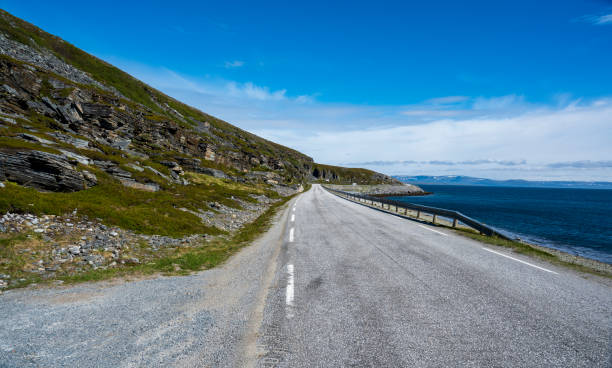 istock Road on the sea coast under the hills 2075153069