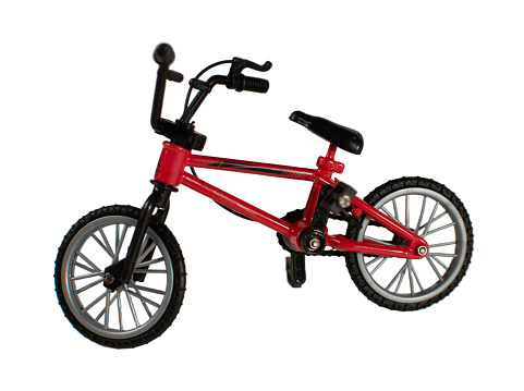 A red bike with a black handlebar and a black seat