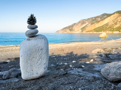 Balancing stones on Agios Pavlos beach in Crete (Greece).