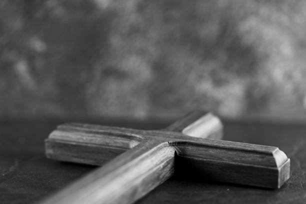 selective crucifix wood cross black and white background for multi concept of motivate and inspiration