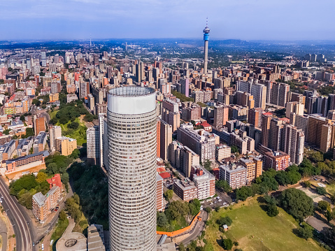 Hillbrow with Ponte City apartments and the communications tower in Johannesburg with the urban residential district.