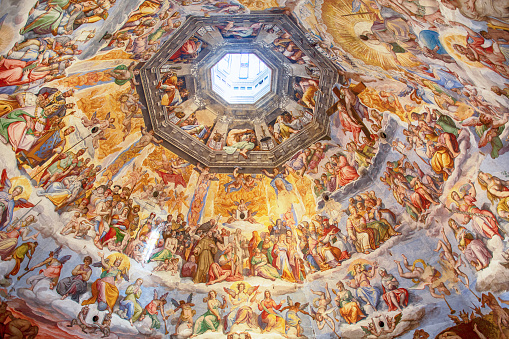 Reggio Emilia - The ceiling fresco of angels with the trumphs in church Chiesa di San Pietro by Anselmo Govi (1939).