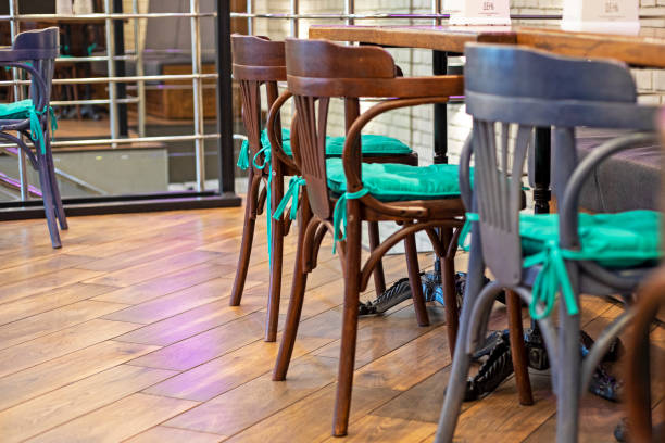 istock wooden chairs with a table in a modern cafe interior 2075283678